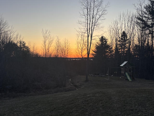 63 Grandview Dr, Newport, ME 04953 - yard at dusk featuring a playground
