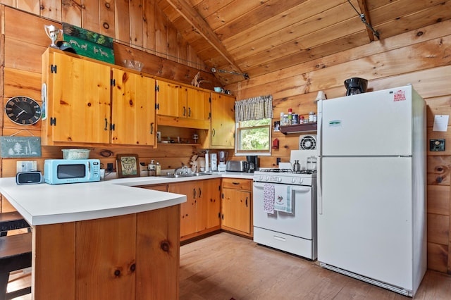 62 Hernborg Rd, Rangeley, ME 04970 - kitchen with white appliances, light wood-style floors, a peninsula, wooden ceiling, and light countertops