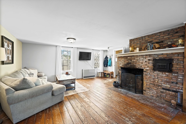 30 Joy Valley Rd, Buxton, ME 04093 - living room featuring wood-type flooring and a brick fireplace