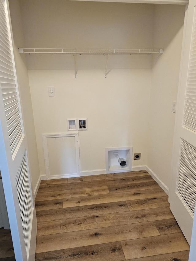 310 Emery Mills Rd, Shapleigh, ME 04076 - washroom featuring hookup for an electric dryer, hookup for a washing machine, and wood finished floors