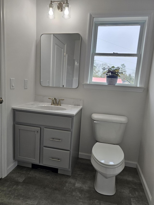 310 Emery Mills Rd, Shapleigh, ME 04076 - bathroom with vanity and toilet