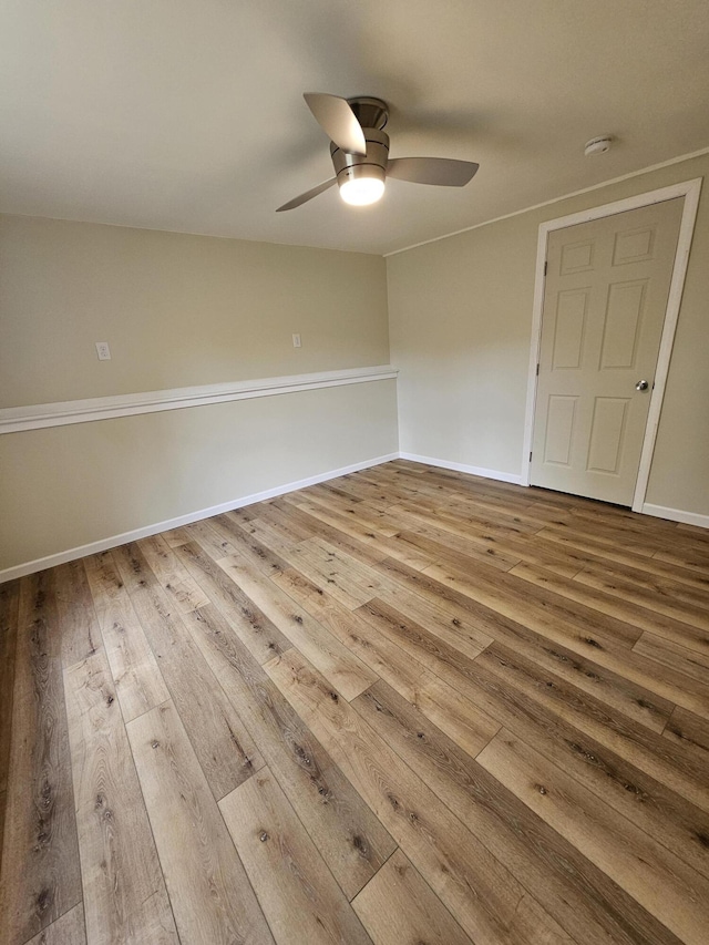 310 Emery Mills Rd, Shapleigh, ME 04076 - empty room with wood-type flooring, ceiling fan, and a smoke detector