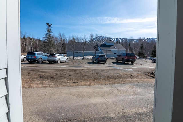 exterior space featuring a mountain view