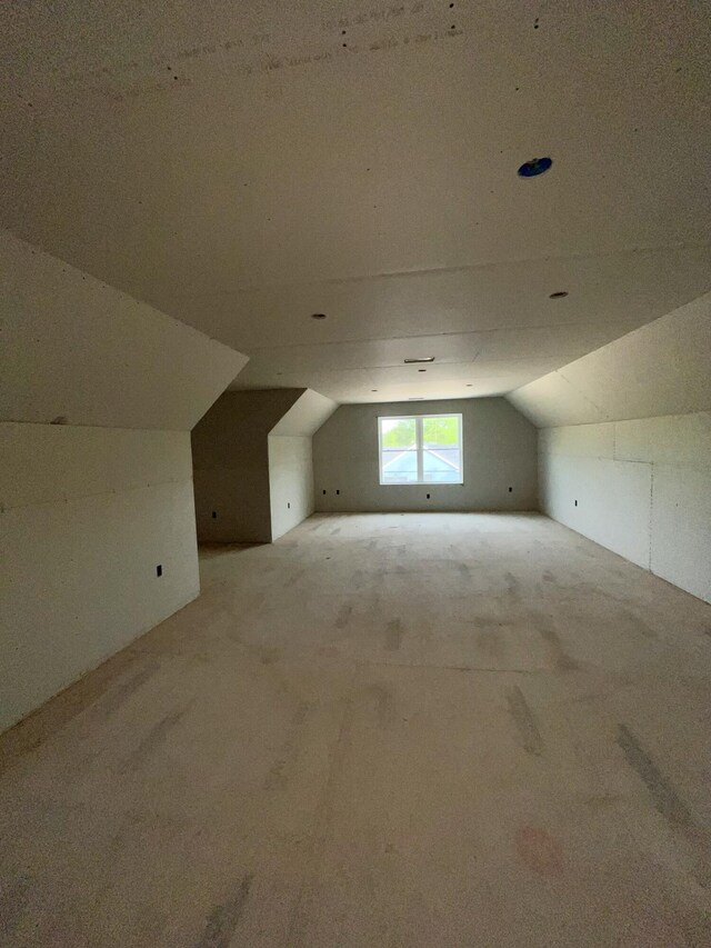 43 Heritage Dr, Berwick, ME 03901 - bonus room with vaulted ceiling and light colored carpet