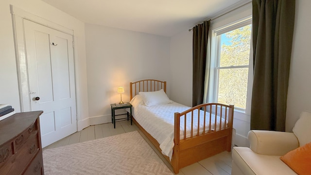 bedroom featuring baseboards