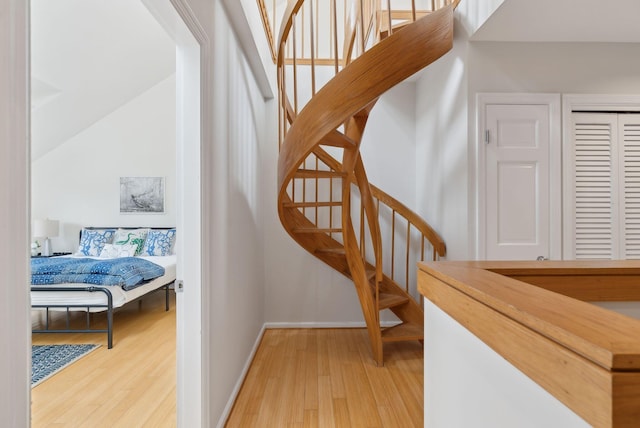105 Chandlers Wharf Unit 105, Portland, ME 04101 - staircase featuring wood finished floors and baseboards