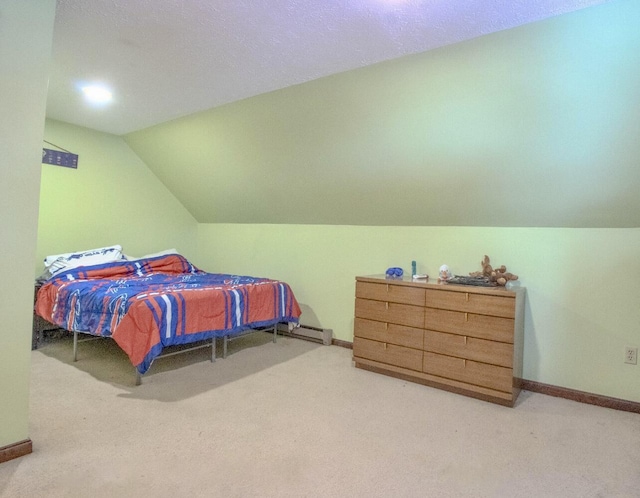 carpeted bedroom with baseboards and lofted ceiling