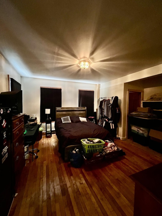 bedroom featuring hardwood / wood-style floors