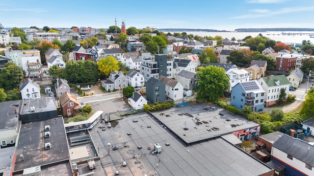 aerial view featuring a water view and a residential view