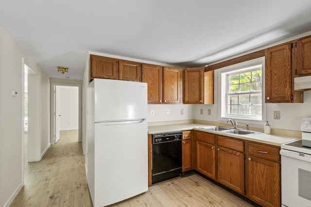 10 Trues Rd, Lincolnville, ME 04849 - kitchen featuring white appliances, a sink, light wood-style floors, and light countertops