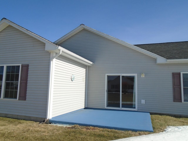 back of property with a patio area