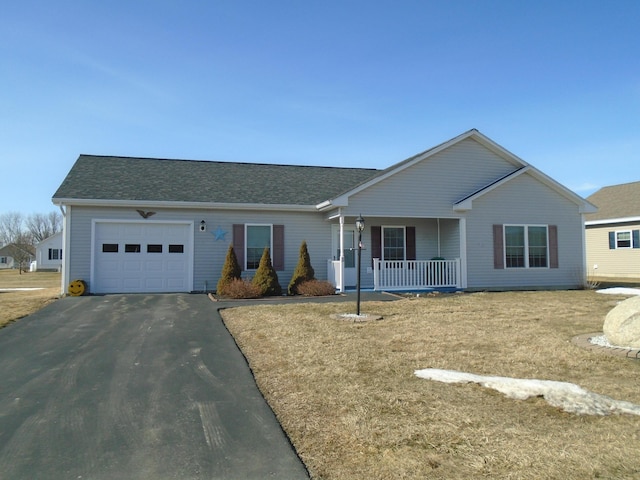 single story home with a front yard, a porch, an attached garage, a shingled roof, and aphalt driveway