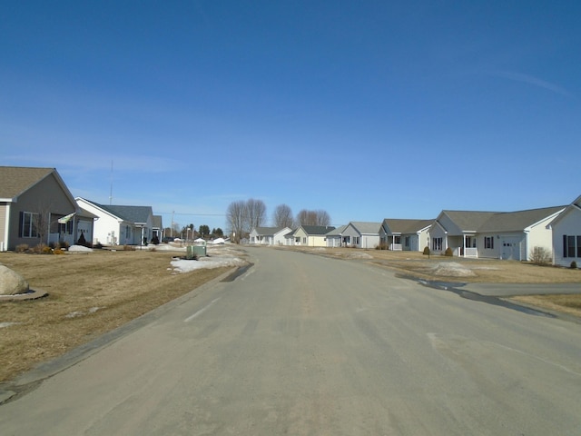 view of road with a residential view