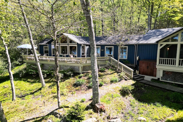 29 Good Day Dr, South Bristol, ME 04568 - view of front of home featuring a wooden deck and a sunroom