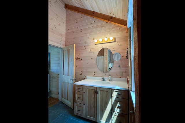 29 Good Day Dr, South Bristol, ME 04568 - bathroom featuring wood walls, vanity, and tile patterned flooring