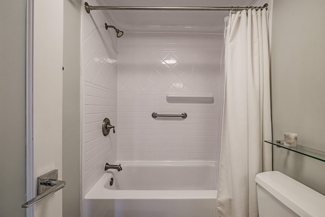 bathroom featuring toilet and shower / tub combo with curtain