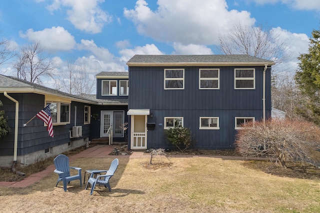 11 Elm Dr, York, ME 03909 - view of front of house with french doors and a shingled roof