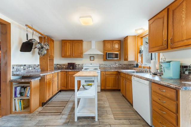 11 Elm Dr, York, ME 03909 - kitchen featuring wall chimney range hood, white appliances, brown cabinetry, and a sink