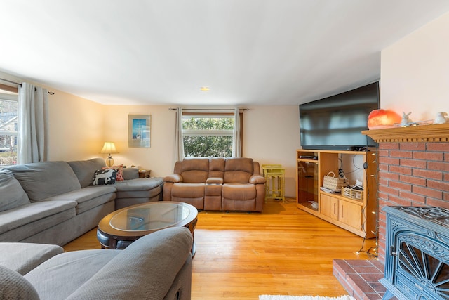 11 Elm Dr, York, ME 03909 - living area with light wood-type flooring and a fireplace