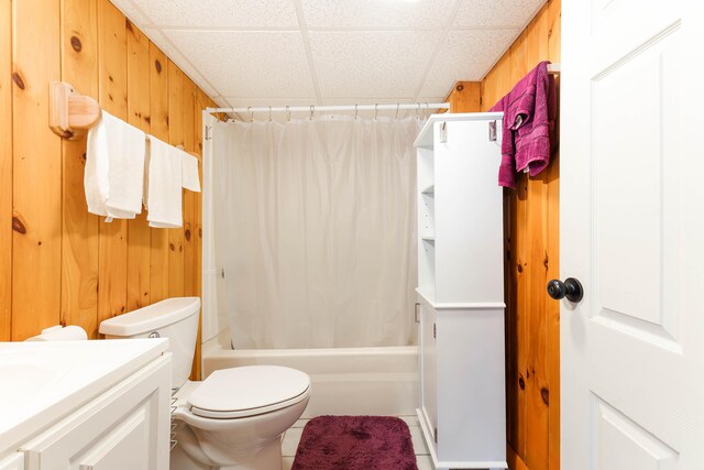 11 Elm Dr, York, ME 03909 - full bath featuring a paneled ceiling, vanity, toilet, shower / bath combo, and wooden walls
