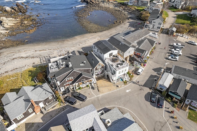 bird's eye view with a residential view and a water view