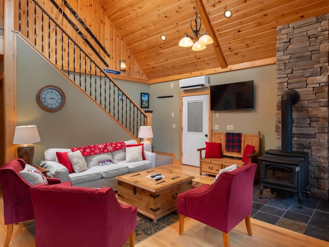 living room featuring a wall mounted air conditioner, a notable chandelier, stairs, wooden ceiling, and a wood stove