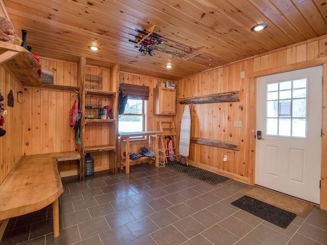 mudroom featuring wooden ceiling, recessed lighting, and wood walls