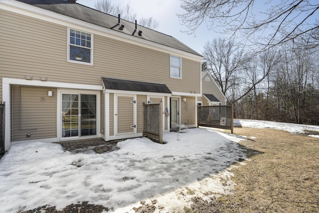 view of snow covered property