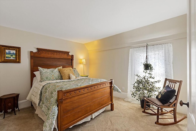 bedroom with light colored carpet