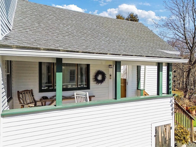 exterior space with a shingled roof