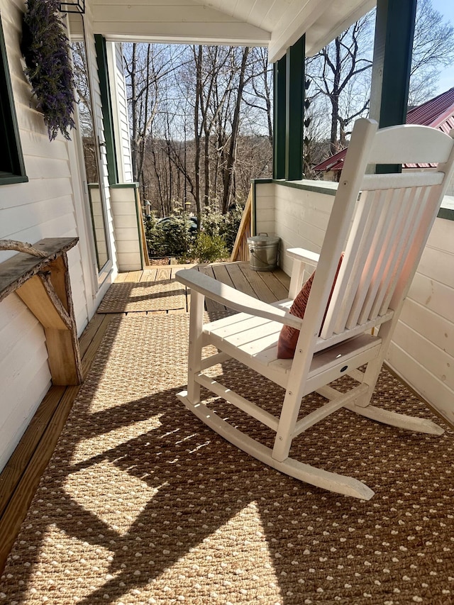 balcony featuring a porch