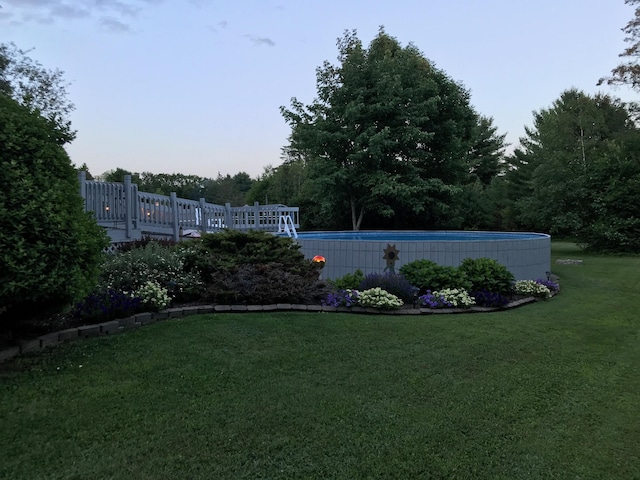 view of yard with an outdoor pool