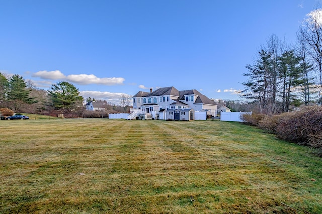 16 Ocean Greens Dr, Saco, ME 04072 - view of yard featuring stairway and fence