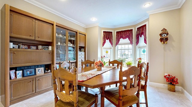 16 Ocean Greens Dr, Saco, ME 04072 - dining room with baseboards, ornamental molding, and light tile patterned floors