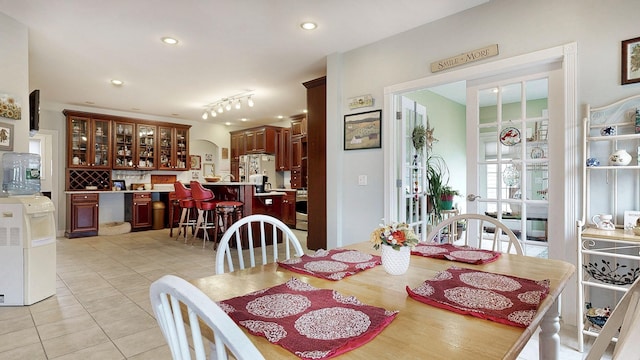 16 Ocean Greens Dr, Saco, ME 04072 - dining room with light tile patterned floors and recessed lighting