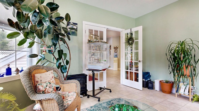16 Ocean Greens Dr, Saco, ME 04072 - living area featuring tile patterned floors and french doors