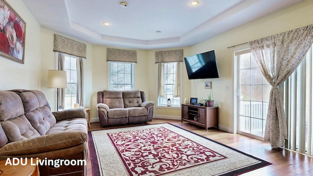 16 Ocean Greens Dr, Saco, ME 04072 - living area with a raised ceiling, recessed lighting, baseboards, and wood finished floors