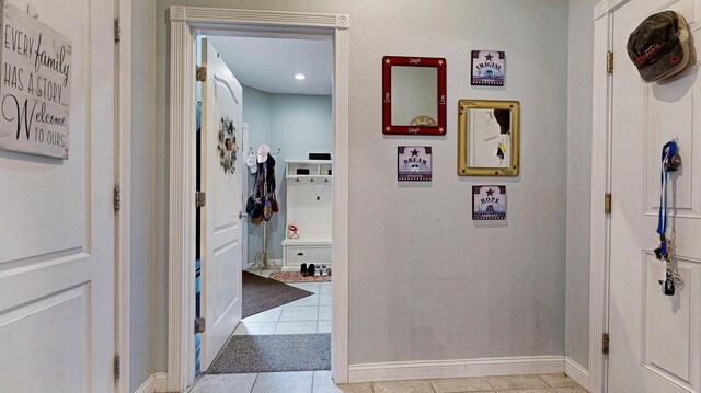 16 Ocean Greens Dr, Saco, ME 04072 - hallway featuring baseboards and light tile patterned floors
