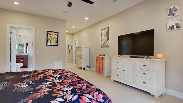 16 Ocean Greens Dr, Saco, ME 04072 - bedroom featuring connected bathroom, recessed lighting, a ceiling fan, a sink, and light colored carpet