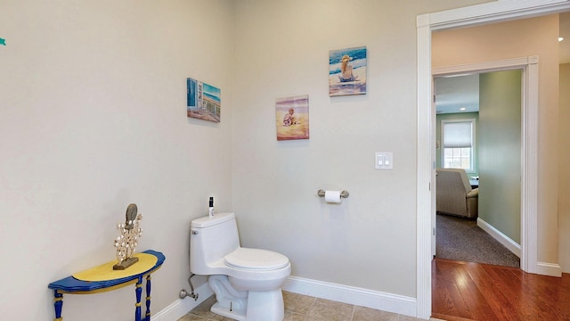 16 Ocean Greens Dr, Saco, ME 04072 - bathroom featuring baseboards and toilet