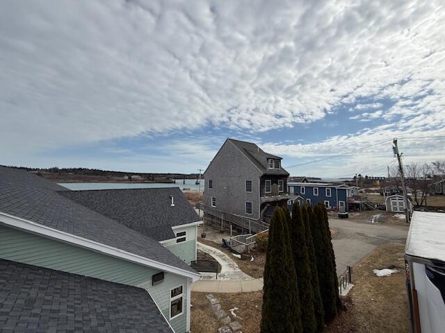 6 School St, Lubec, ME 04652 - view of side of property with a shingled roof