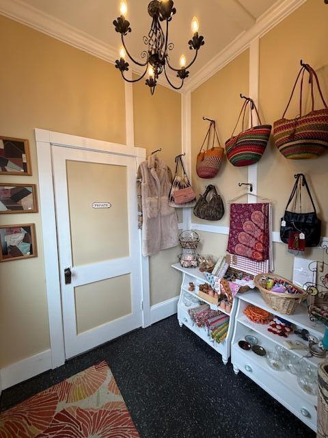 6 School St, Lubec, ME 04652 - mudroom with a notable chandelier, baseboards, and ornamental molding