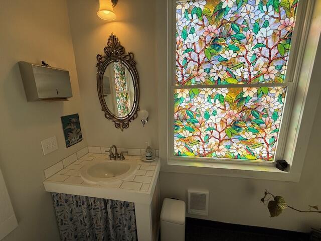 6 School St, Lubec, ME 04652 - bathroom with a sink and visible vents