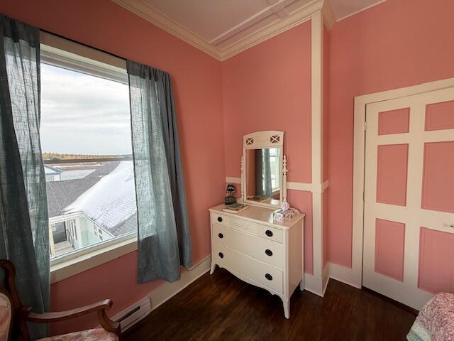 6 School St, Lubec, ME 04652 - interior space with dark wood finished floors, crown molding, a baseboard heating unit, and baseboards