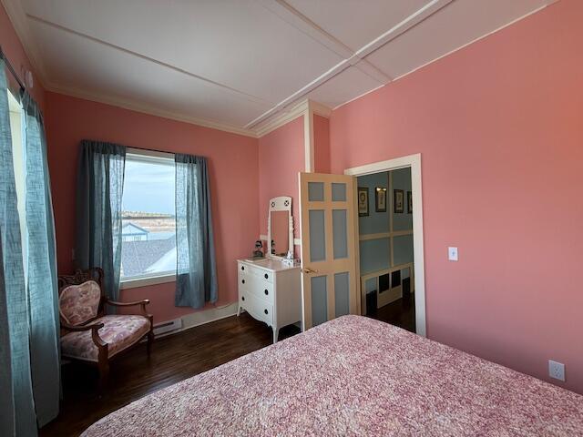 6 School St, Lubec, ME 04652 - bedroom featuring dark wood-type flooring and ornamental molding