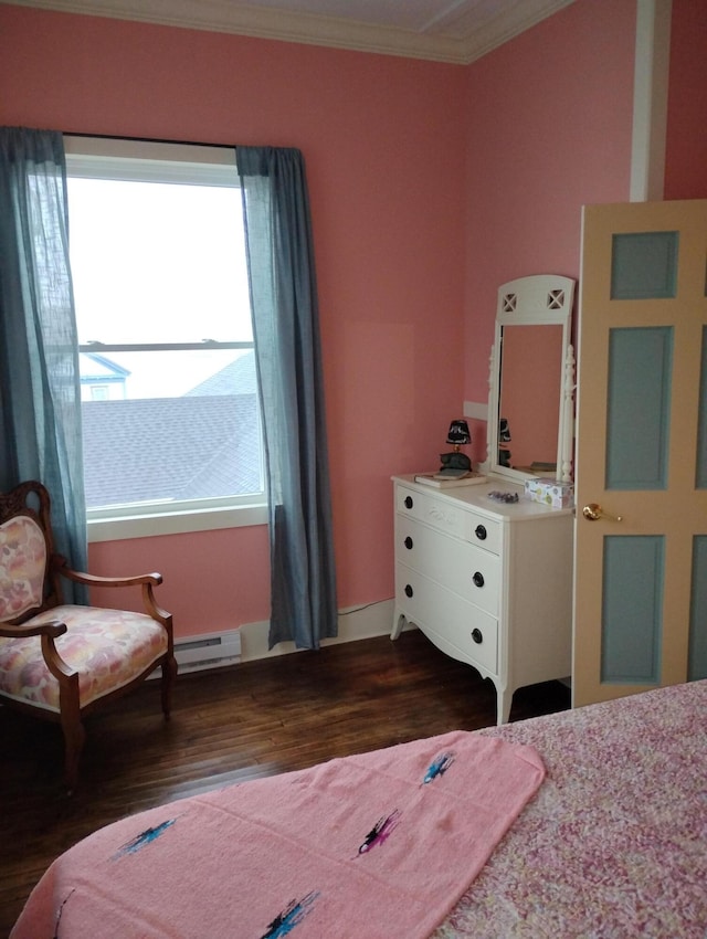6 School St, Lubec, ME 04652 - bedroom with dark wood-style floors, baseboard heating, crown molding, and baseboards
