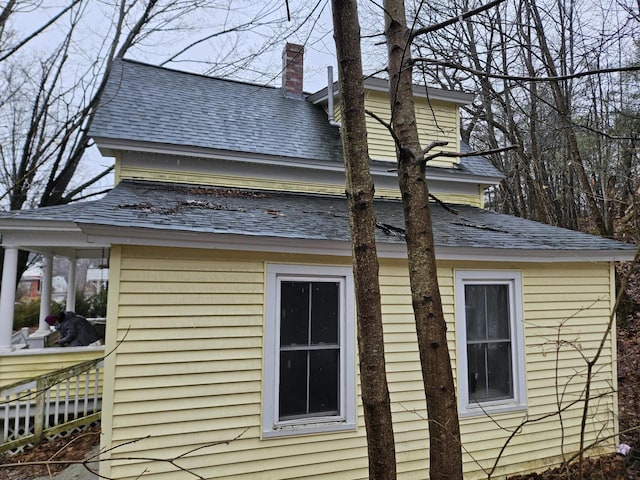 68 Boothby St, Augusta, ME 04330 - view of property exterior with a chimney and roof with shingles