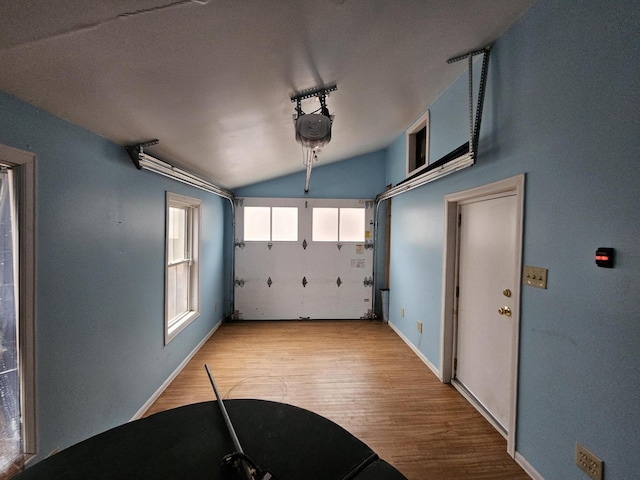 68 Boothby St, Augusta, ME 04330 - garage with baseboards and a garage door opener