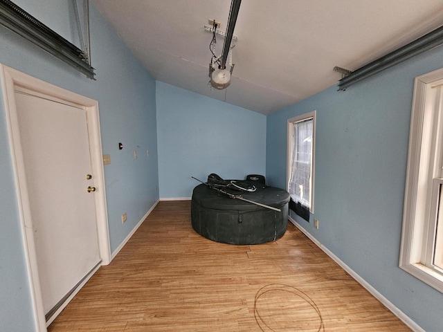 68 Boothby St, Augusta, ME 04330 - living area with baseboards, vaulted ceiling, and light wood-type flooring