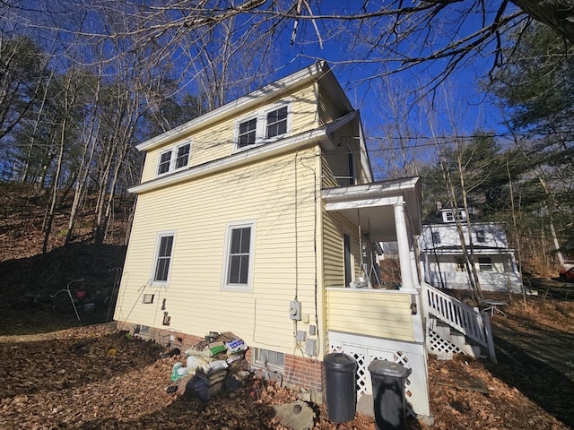 68 Boothby St, Augusta, ME 04330 - view of side of property featuring covered porch